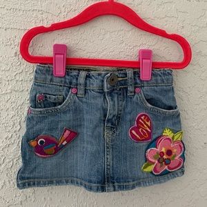Girls denim skirt with patch work.